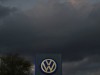 The logo of German carmaker Volkswagen is seen at a VW dealership in Hamburg, in this October 28, 2013 file photo. The scandal engulfing Volkswagen, which has admitted cheating diesel vehicle emissions tests in the United States, spread on Tuesday as South Korea said it would conduct its own investigation and a French minister called for an EU-wide probe. REUTERS/Fabian Bimmer/Files