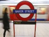 A passenger walks through Baker Street Underground station, in central London January 9, 2013. London Underground celebrates 150 years since the first underground journey took place on January 9, 1863.  REUTERS/Andrew Winning (BRITAIN - Tags: ANNIVERSARY SOCIETY TRANSPORT TRAVEL) - RTR3C8QM